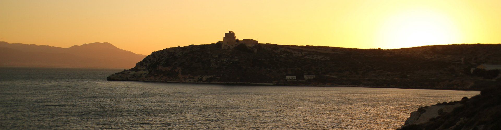 Sonnenuntergang hinter dem Leuchtturm von Cala Mosca bei Cagliari Leuchtturm Cagliari Cala Mosca - Jax 2013