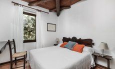 Villa Romana | Schlafzimmer 2 mit Doppelbett und Gartenblick Villa Romana, Costa Rei, Südsardinien