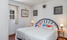 Villa Bau Cannas | In 2019 gebautes neuen Zimmer mit Doppelbett, privatem Bad und Tür zum Garten Villa Bau Cannas Torresalinas Sardinien