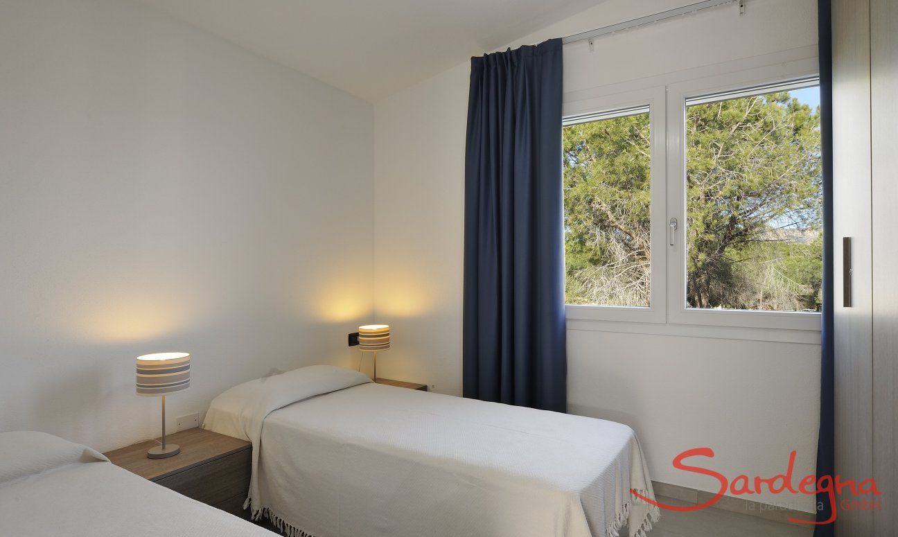 Apartment Cala Liberotto II | Schlafzimmer 2 mit Einzelbetten Schlafzimmer 2 mit Einzelbetten