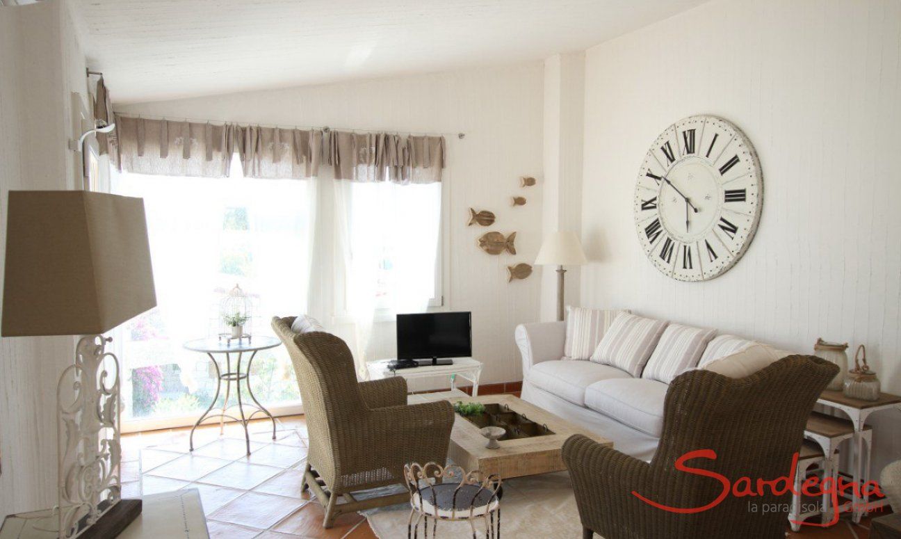 Li Conchi 21 | Wohnzimmer mit Sofaecke und großem Panoramafenster Wohnzimmer