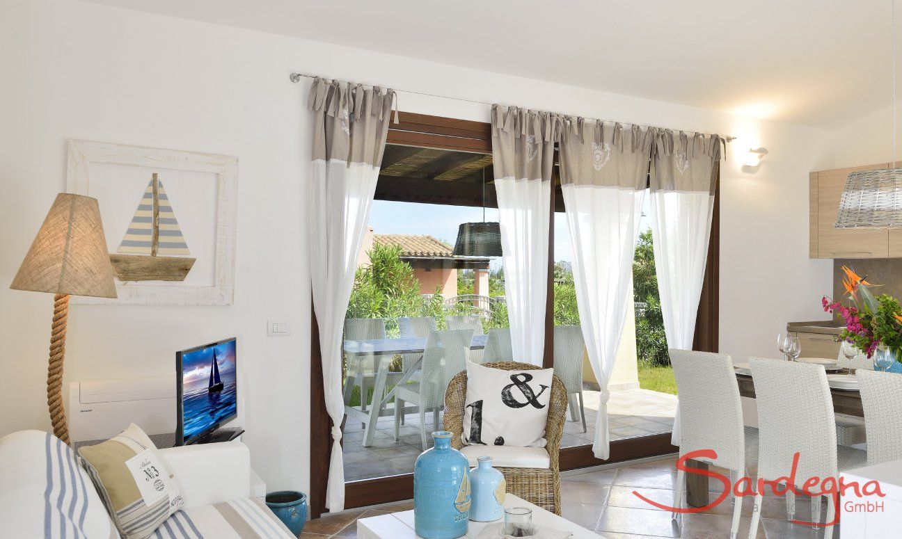 Villa Campidano 8 | Wohnzimmer aufgeteilt in Sofaecke, Essbereich und Küche Wohnzimmer