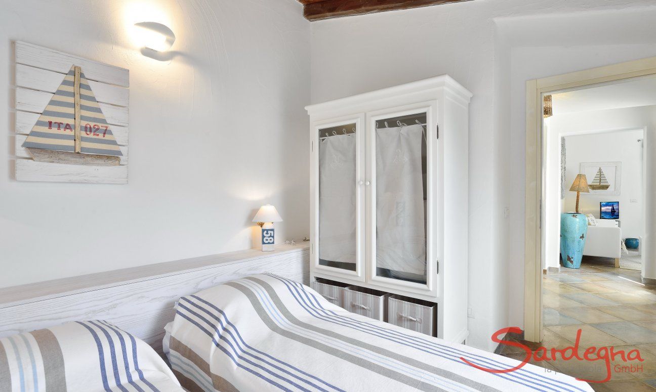 Villa Campidano 8 | Schlafzimmer 3 mit zwei Einzelbetten, die auch zusammengestellt werden können Schlafzimmer