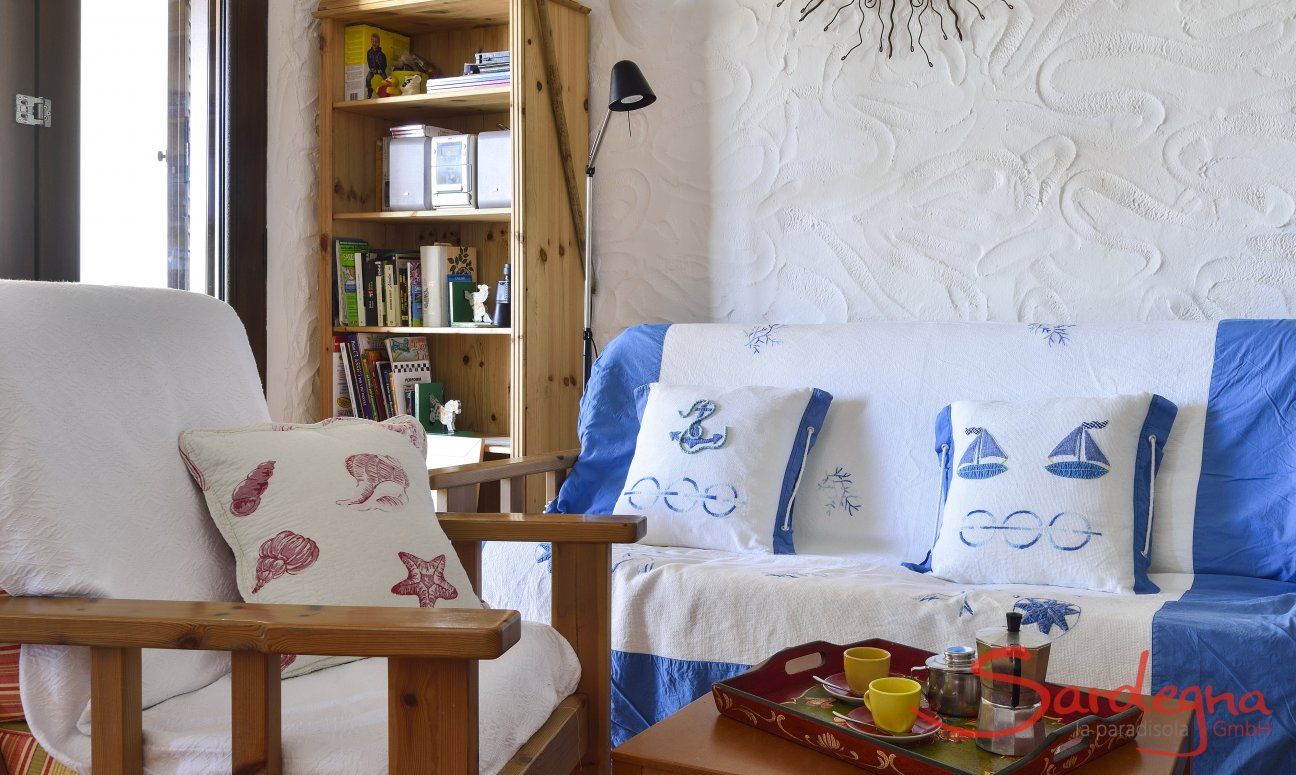 Villa Gaia | Wohnzimmer mit gemütlicher Sofa-Ecke Wohnzimmer mit gemütlicher Sofa-Ecke