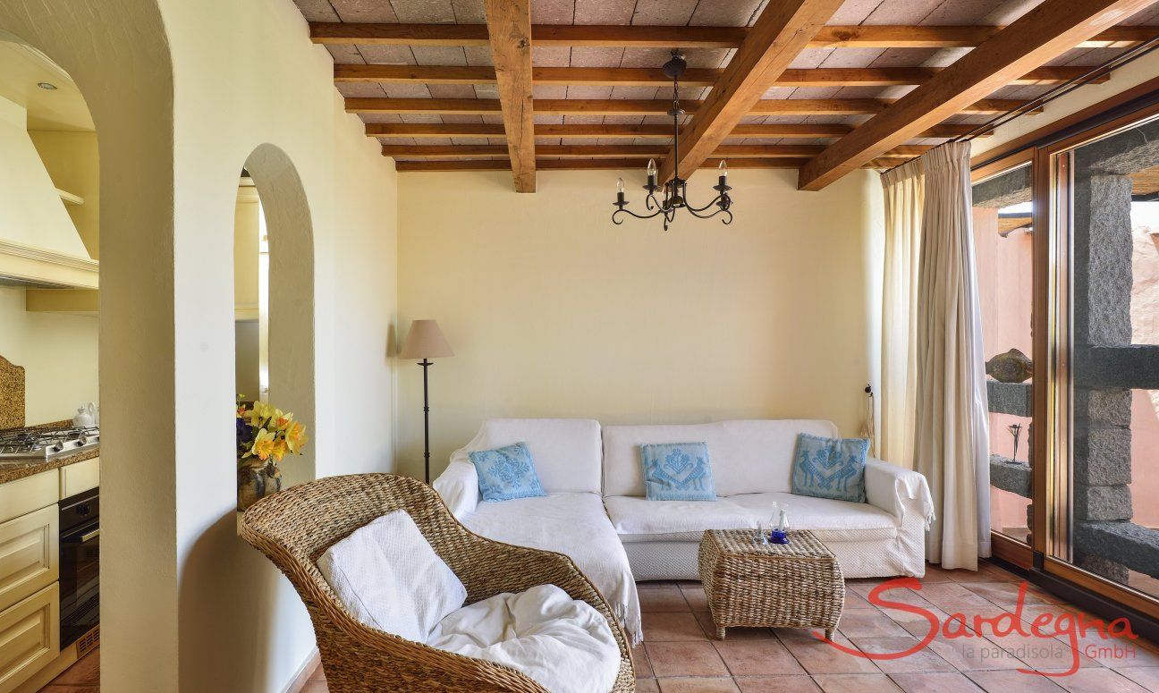 Villa Domus 17 | Wohnzimmer mit großer Glasfront und Terrassenzugang Wohnzimmer mit großer Glasfront und Terrassenzugang