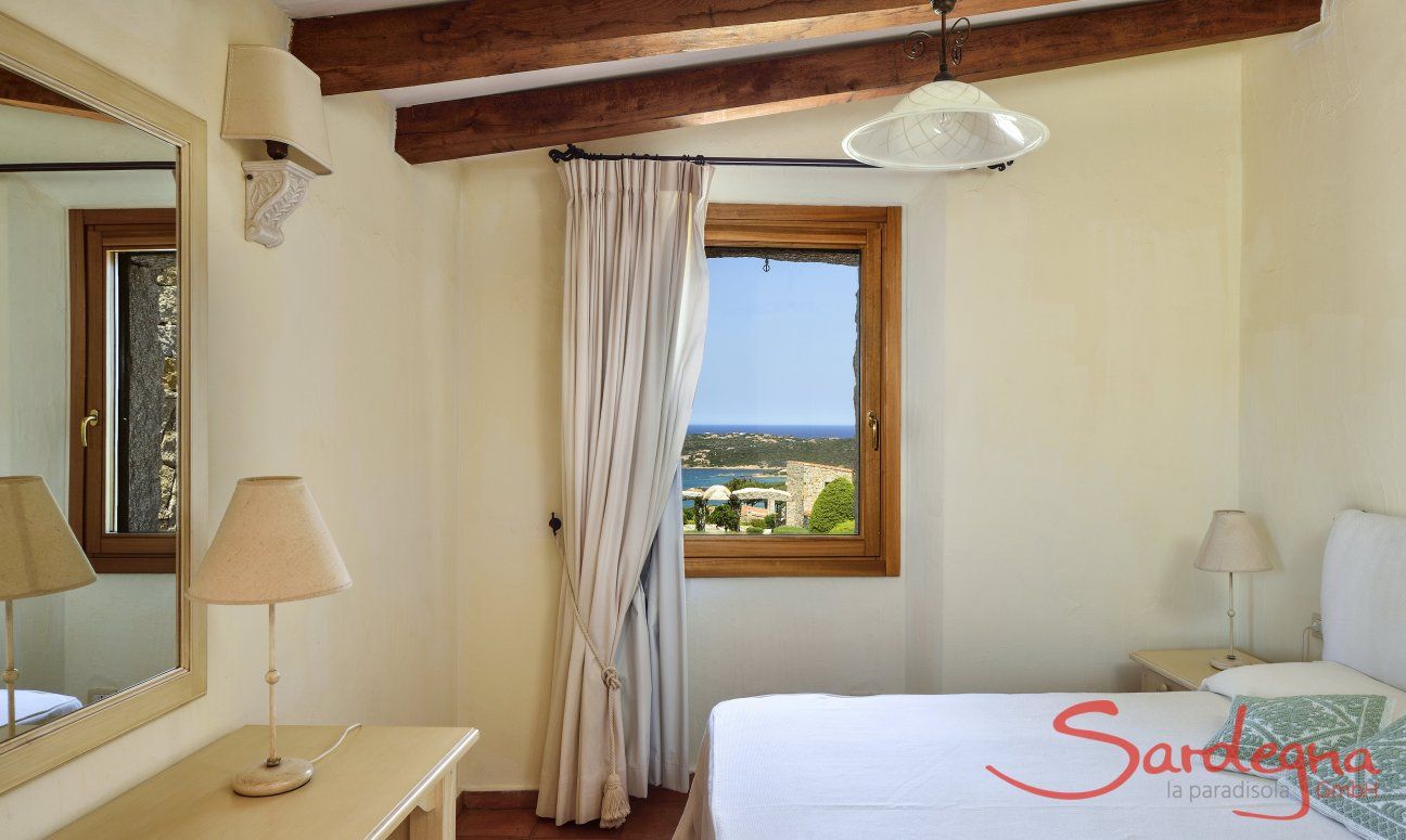 Villa Domus 17 | Schlafzimmer 2 mit Doppelbett und Meerblick Schlafzimmer 2 mit Doppelbett und Meerblick