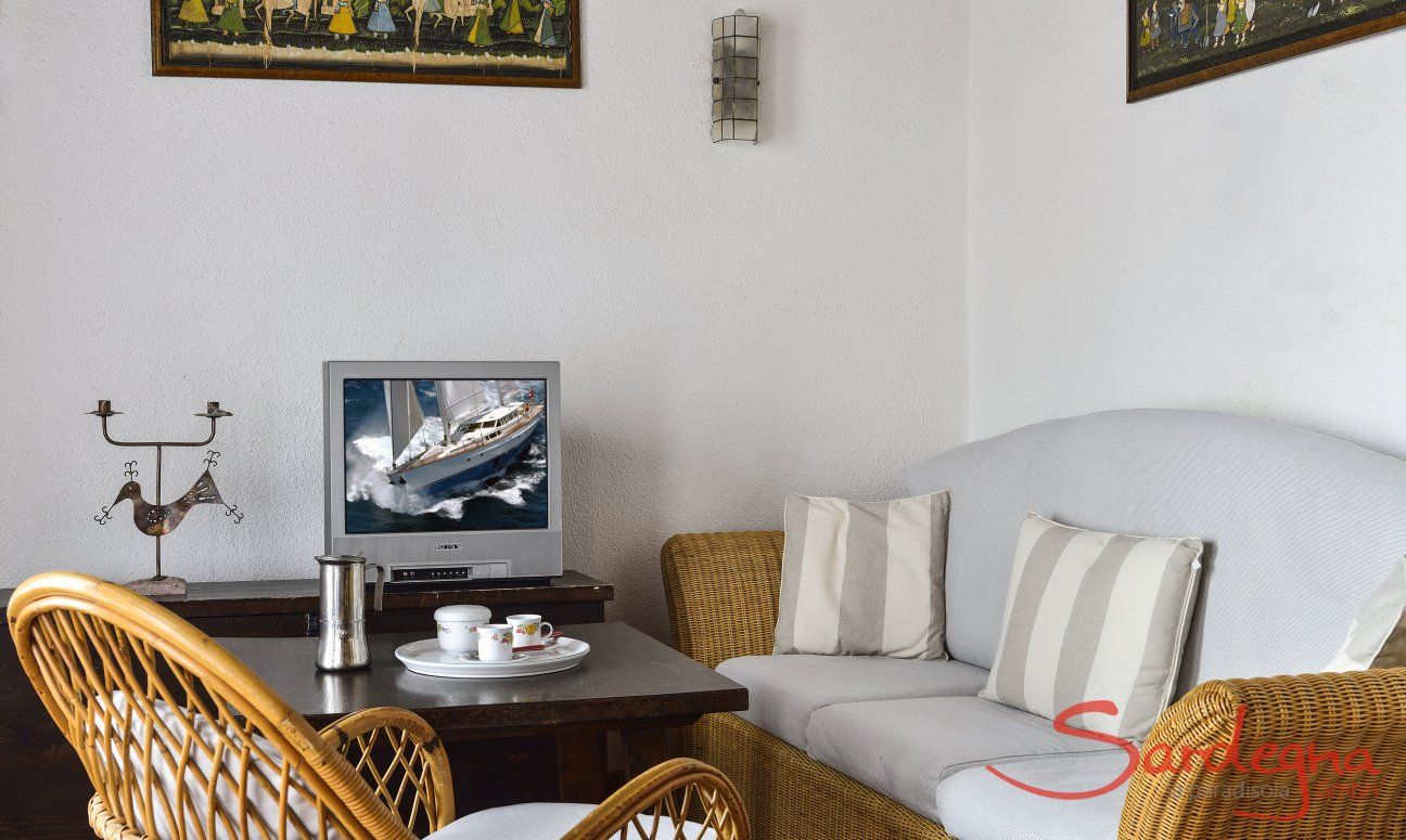 Villa Ibiscus | Gemütliche Sofaecke mit TV Gemütliche Sofaecke mit TV