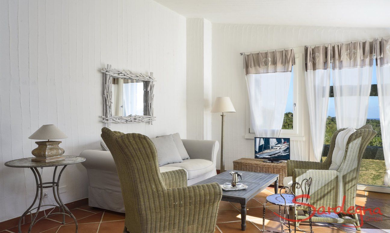 Li Conchi 38 | Wohnzimmer mit Sofaecke und Panoramafenster Wohnzimmer mit Panoramafenster