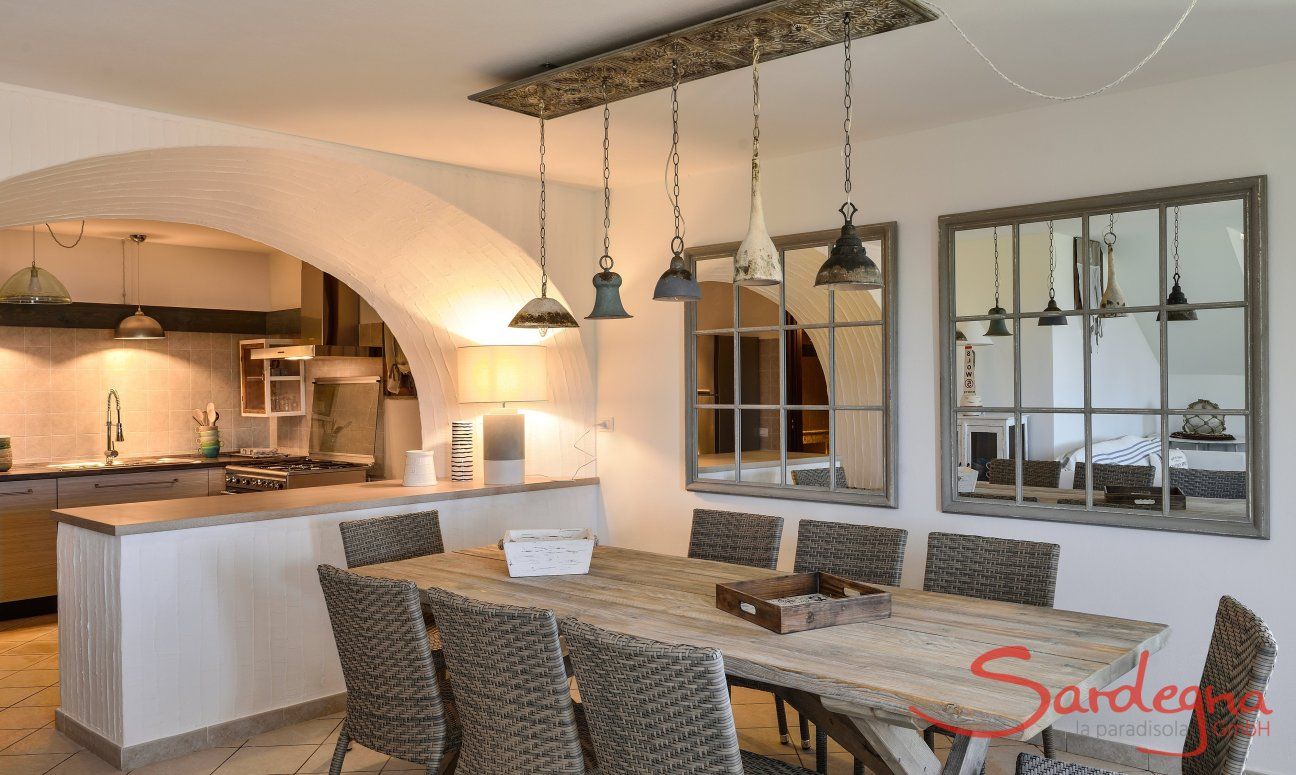 Apartment Orchidea-A | Küche und Essbereich sind durch eine Bar getrennt Küche und Essbereich sind durch eine Bar getrennt