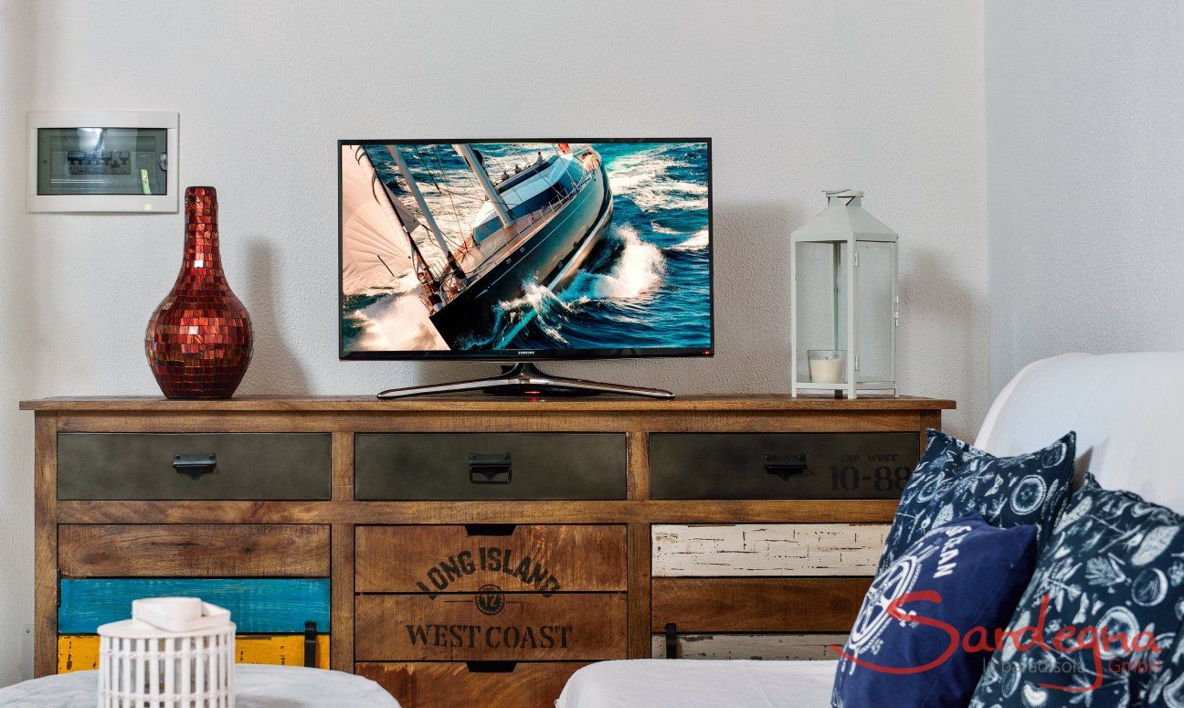 Villa Chiara | Sofaecke mit TV im Wohnbereich Sofaecke mit TV im Wohnbereich