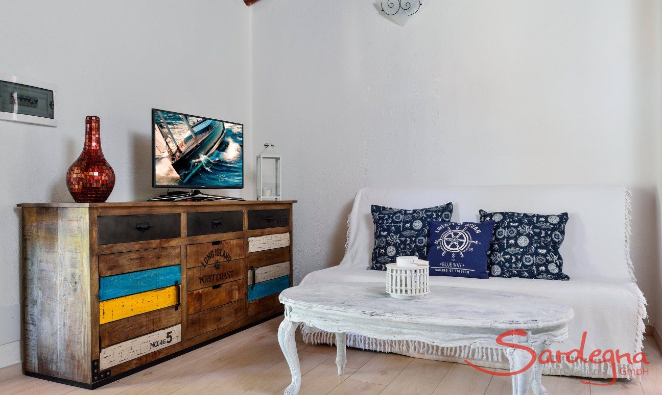 Villa Chiara | Stilvolles Wohnzimmer mit TV-Ecke Stilvolles Wohnzimmer mit TV-Ecke