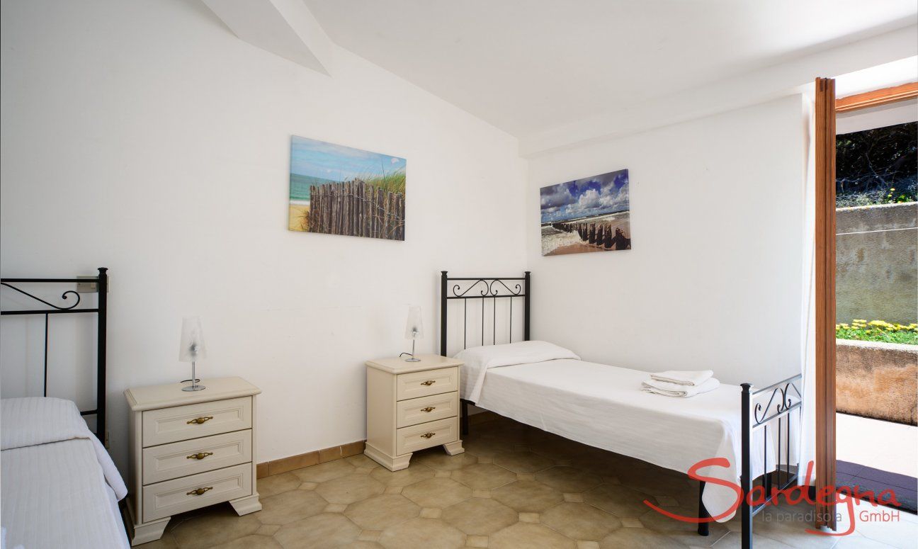 Villa Marco | Schlafzimmer 2 mit Gartenzugang Schlafzimmer 2 mit Gartenzugang