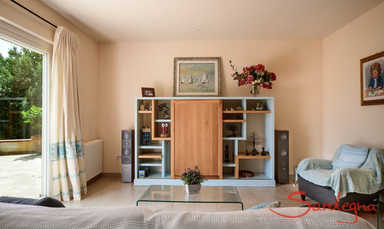 Villa Caroline | Wohnzimmer mit gemütlicher Sofaecke Wohnzimmer mit gemütlicher Sofaecke