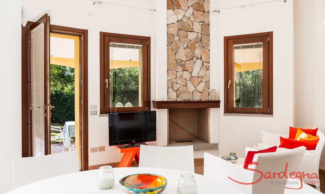 Villa Sandra 43 | Zugang vom Wohnzimmer auf die Terrasse Hausdarstellung