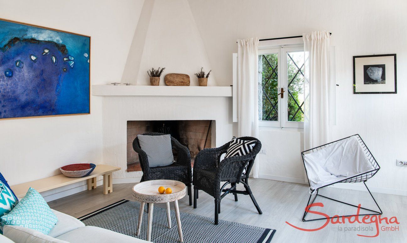 Casa 1 | Gemütlicher Wohnraum mit Kamin Einrichtung Casa 1 Sant'Elmo