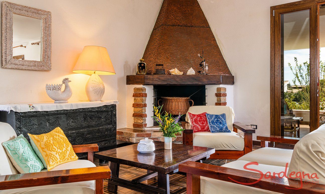 Villa Palme | Sitzecke im Wohnraum direkt am Kamin New Picture