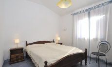 Apartment Castededdu 5 | Schlafzimmer 1 mit Doppelbett Schlafzimmer 1 mit Doppelbett