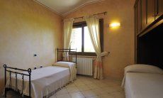 Villa Il Palmeto | Schlafzimmer 3 mit zwei Einzelbetten Schlafzimmer 3 mit zwei Einzelbetten