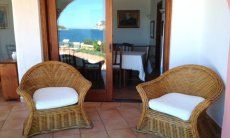 Villa Cala Ginepro | Relaxen auf der Terrasse Relaxen auf der hinteren Terrasse