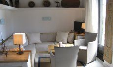 Villetta 3 | Wohnzimmer mit Zugang über die Terrasse zum Garten Wohnbereich mit Zugang zur Terrasse und dem Garten