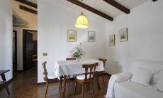 Casa Su Faru 4 | Wohnbereich mit Esstisch und Sofa-Ecke Wohnbereich mit Esstisch und Sofa-Ecke
