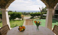 Apartment Castededdu 8 | Terrasse mit Blück auf den Garten Terrasse mit Blück auf den Garten