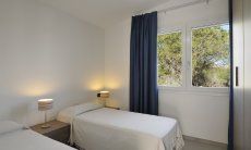 Apartment Cala Liberotto II | Schlafzimmer 2 mit Einzelbetten Schlafzimmer 2 mit Einzelbetten