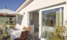 Apartment Cala Liberotto II | Terrasse mit Küchenzugang Terrasse mit Küchenzugang