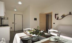 Apartment Cala Liberotto II | Heller Wohn- und Küchenbereich Heller Wohn- und Küchenbereich
