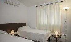 Villa Caterina | Schlafzimmer 2 mit zwei Einzelbetten Schlafzimmer