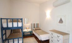 Li Conchi 33 | Schlafzimmer 2 mit Hochbett und einem Einzelbett Schlafzimmer 2