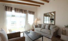 Li Conchi 18 | Helles Wohnzimmer mit Sitzecke Wohnzimmer