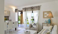 Villa Campidano 21 | Wohnbereich mit Terrassenzugang Wohnzimmer mit Ausgang zum Pool von Villa Campidano 21
