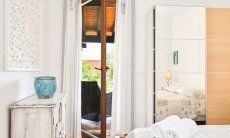 Villa Campidano 7 | Schlafzimmer 1 mit Doppelbett und Zugang zur Terrasse Schlafzimmer mit Terrassentür