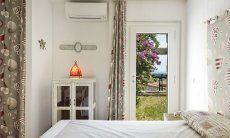 Li Conchi 8 | Schlafzimmer 2 mit Tür zum Garten Schlafzimmer mit Tür zum Garten