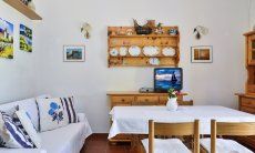 Villa Maria Lina | Wohnbereich mit Sofa und Essplatz Wohnbereich mit Sofa und Essplatz