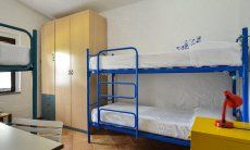 Villa Gaia | Schlafzimmer 3 mit 2 Etagenbetten 4-Bett-Zimmer mit Schrank