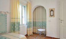 Li Conchi 10 | Schlafzimmer 2 mit Wandschrank Schlafzimmer Li Conchi 10, Cala Sinzias