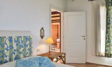 Villa Domus 9d | Schlafzimmer 1 mit Doppelbett und Terrassenzugang Schlafzimmer 1 mit Doppelbett und Terrassenzugang