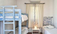 Villa Domus 9d | Schlafzimmer 2 mit Einzelbett und Hochbett Schlafzimmer 2 mit Einzelbett und Hochbett