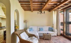 Villa Domus 17 | Wohnzimmer mit großer Glasfront und Terrassenzugang Wohnzimmer mit großer Glasfront und Terrassenzugang
