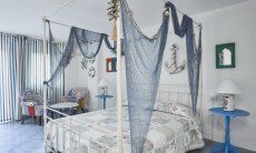 Li Conchi 20 | Schlafzimmer 3 mit Doppelbett und Einzelbett (Foto nicht aktuell) und Tür zum Garten im UG Schlafzimmer 3 UG