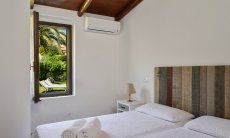Villa Chiara | Schlafzimmer 1 mit Doppelbett Schlafzimmer 1 mit Doppelbett