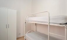 Schlafzimmer 3 mit Stockbett und Stauraum 