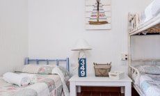 Casa 24 | Schlafzimmer 2 mit Einzelbett und Stockbett Schlafzimmer 2 mit Einzelbett und Stockbett