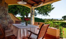 Villa Alessia | Schattige Terrasse mit Esstisch und Meerblick Schattige Terrasse mit Esstisch und Meerblick
