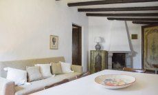 Casa Su Faru 5 | Wohzimmer mit Sofa-Ecke und Kamin Wohzimmer mit Sofa-Ecke und Kamin