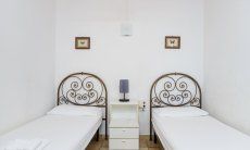 Casa Meloni 1 | Schlafzimmer 2 mit zwei Doppelbetten 2018 New Picture