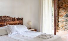 Apartment Castededdu 2 | Schlafzimmer 2 mit Doppelbett und Terrassenzugang Schlafzimmer 2 mit Doppelbett und Terrassenzugang