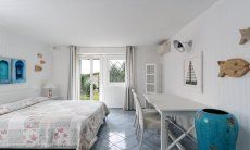 Li Conchi 29 | Schlafzimmer 3 im Untergeschoß mit Ausgang zum Garten 11 2018 New Picture
